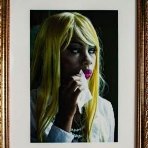 White face and blonde hair
